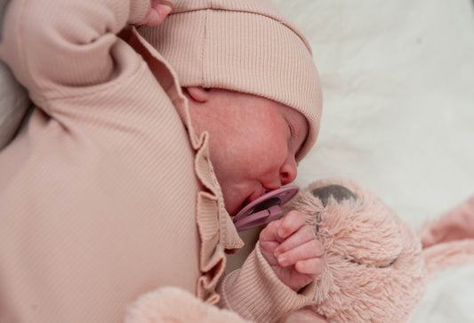 Baby romper rib ruffled nude pink